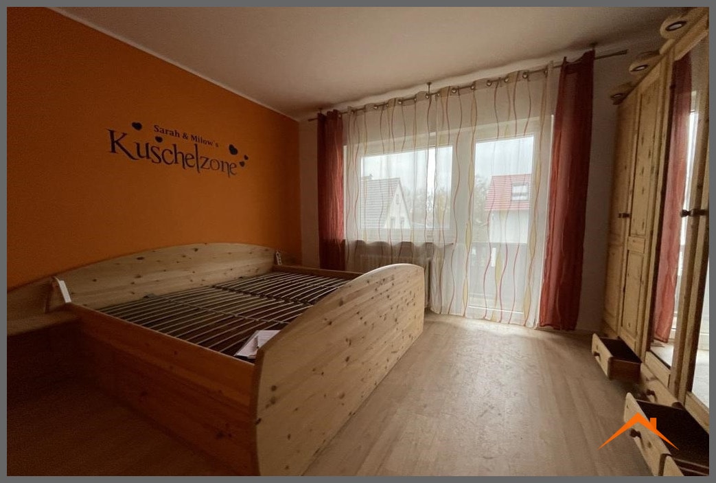 Schlafzimmer mit Balkon