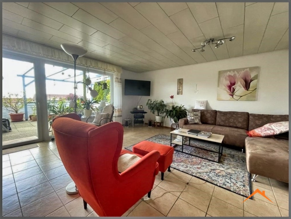 Wohnzimmer mit Zugang Terrasse