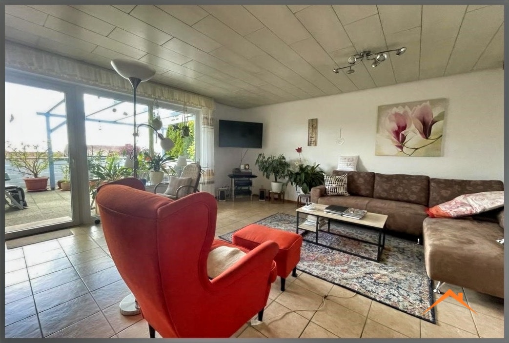 Wohnzimmer mit Zugang Terrasse